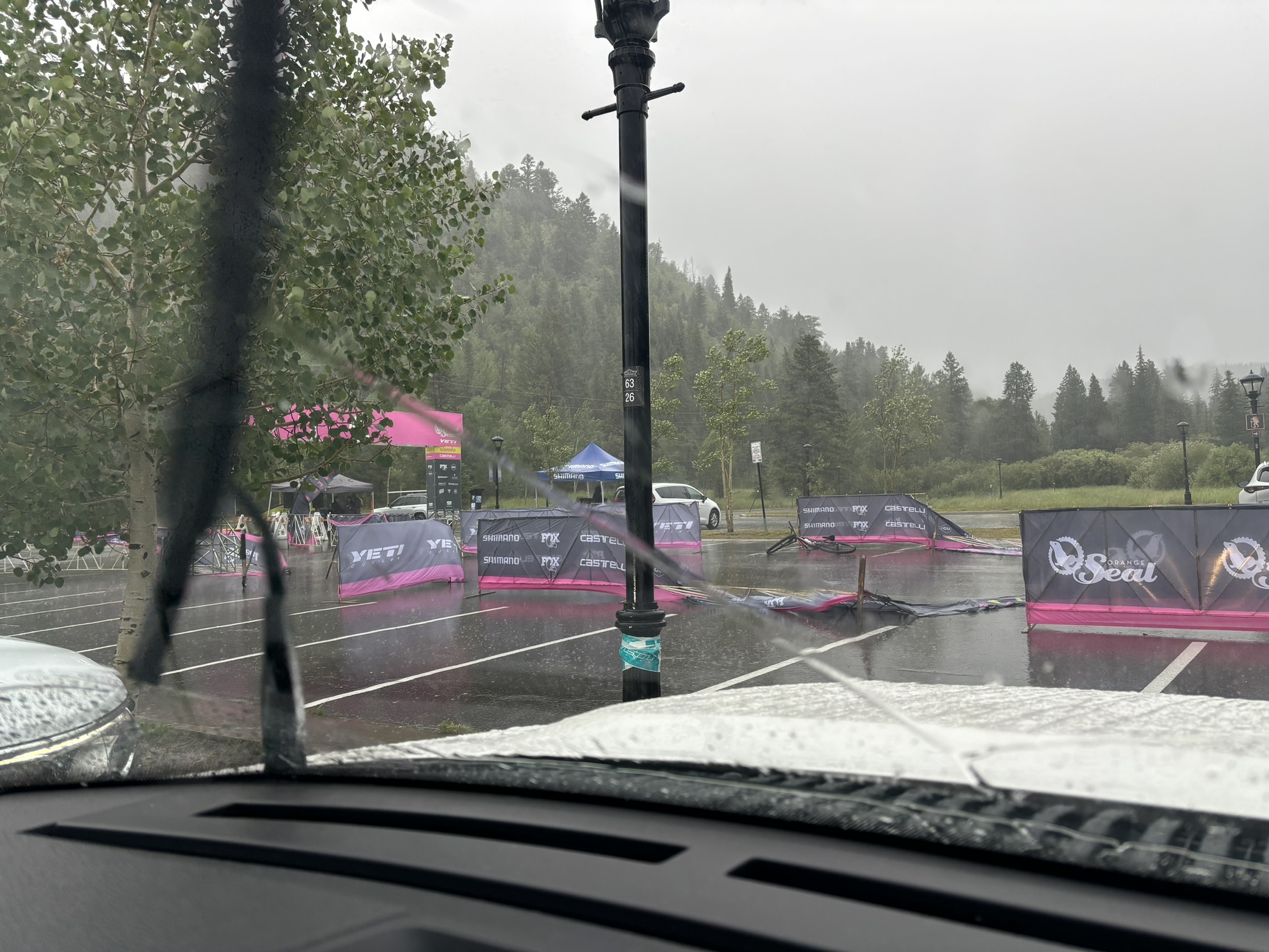 Waiting out the rain before the start of Stage 1.