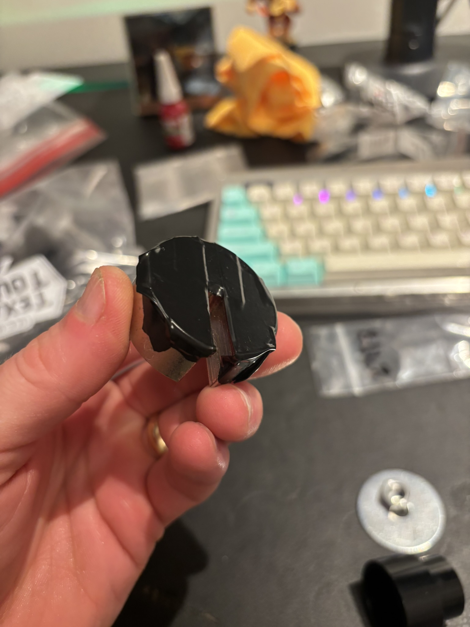 Electrical tape on magnetic back plate to protect paint during pressing