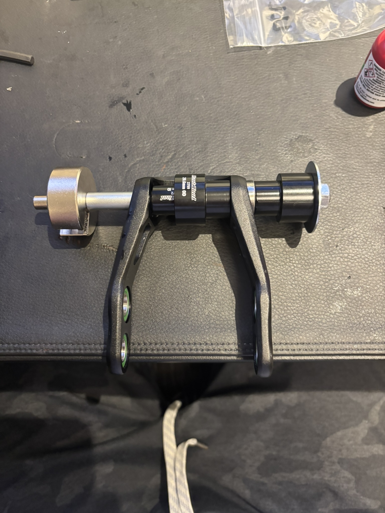 Pressing the first front bearing using the back plate extension